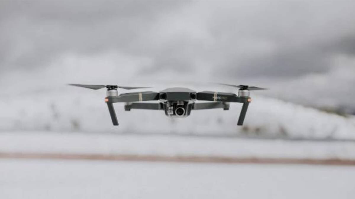 The NSW man was charged with flying a drone in restricted airspace in Canberra.