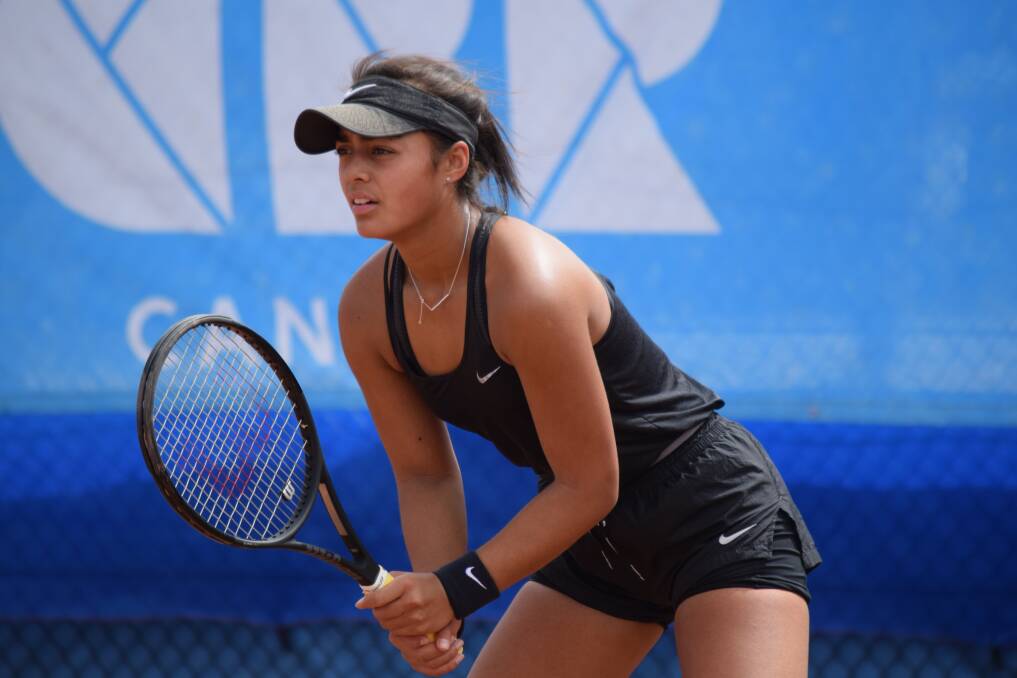 Canberra's Annerly Poulos has bowed out of ths Australian Open wildcard play-offs.