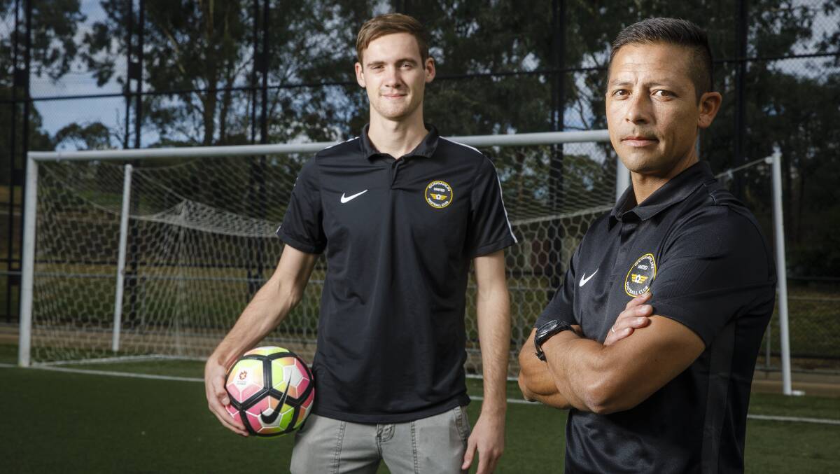 Gungahlin United centre back Jack Green and coach Marcial Munoz. Photo: Sitthixay Ditthavong