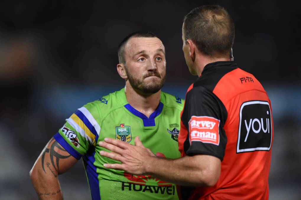 Raiders co-captain Josh Hodgson discusses a decision with the referee. 