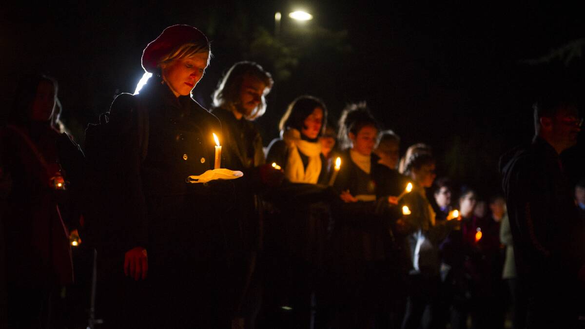Hundreds of people come to the vigil for Eurydice Dixon at Haig Park in June, 2018. Photo: Dion Georgopoulos