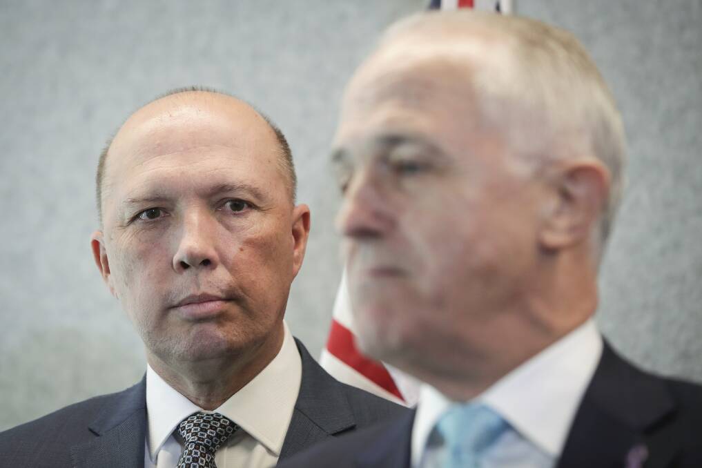 Peter Dutton and Malcolm Turnbull. Picture: Alex Ellinghausen