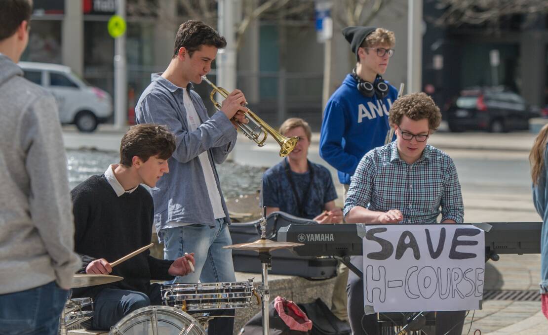 Young musicians held a protest jam outside the legislative assembly last year to demand funding for the 'H Course' be restored. Picture: Karleen Minney.