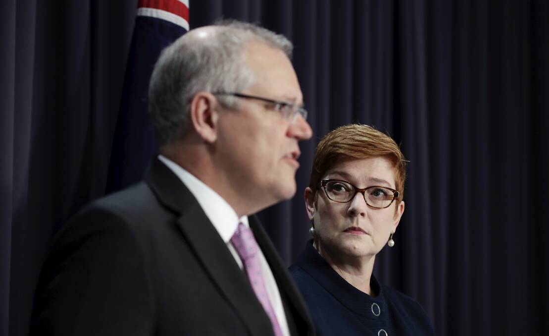 Foreign Minister Marise Payne (right) with Prime Minister Scott Morrison. Ms Payne has said Pacific nations "should be pleased" with Australia's efforts to combat climate change. Picture: Alex Ellinghausen