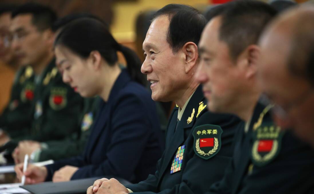 China's Minister of National Defense General Wei Fenghe, centre, in October 2018. Picture: How Hwee Young/AP
