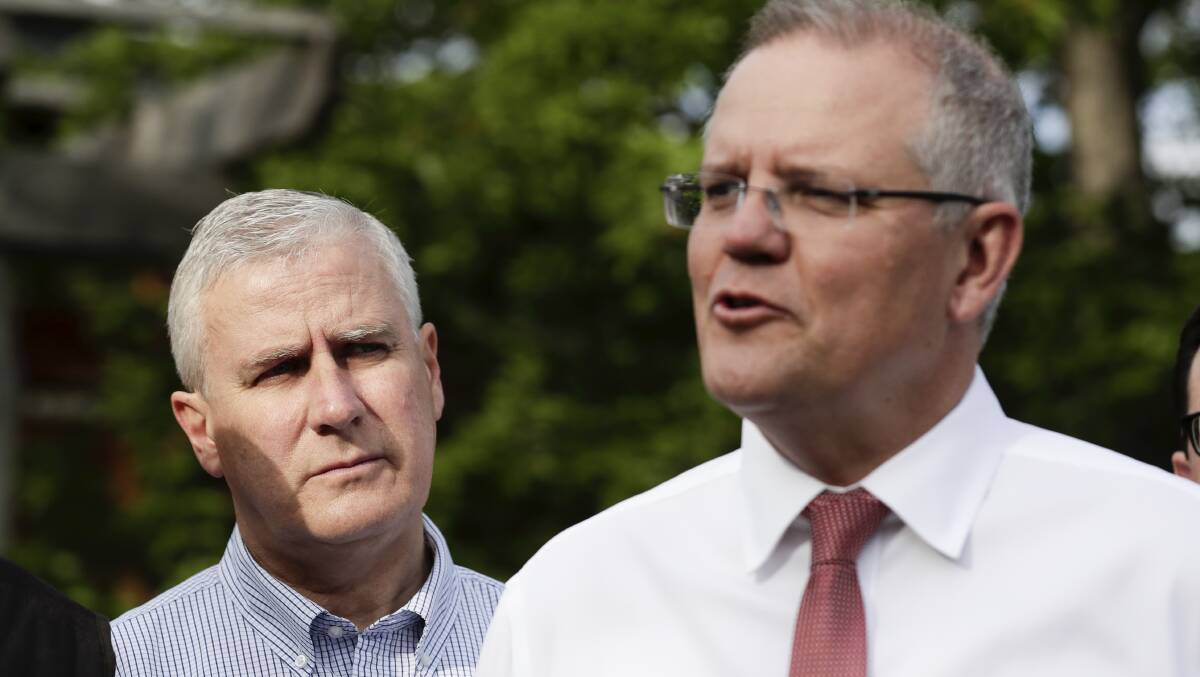 Deputy Prime Minister Michael McCormack (left) has defended the government over the grant decisions. Picture: Alex Ellinghausen