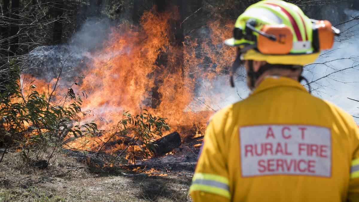 ACT Rural Fire Service crews are fighting a fire in Namadgi National Park. Picture: Elesa Kurtz