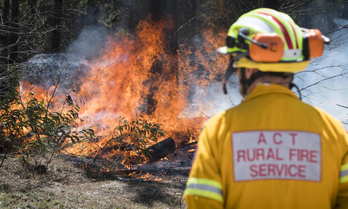 ACT firefighters are controlling a grass fire in Oxley. File picture: Elesa Kurtz