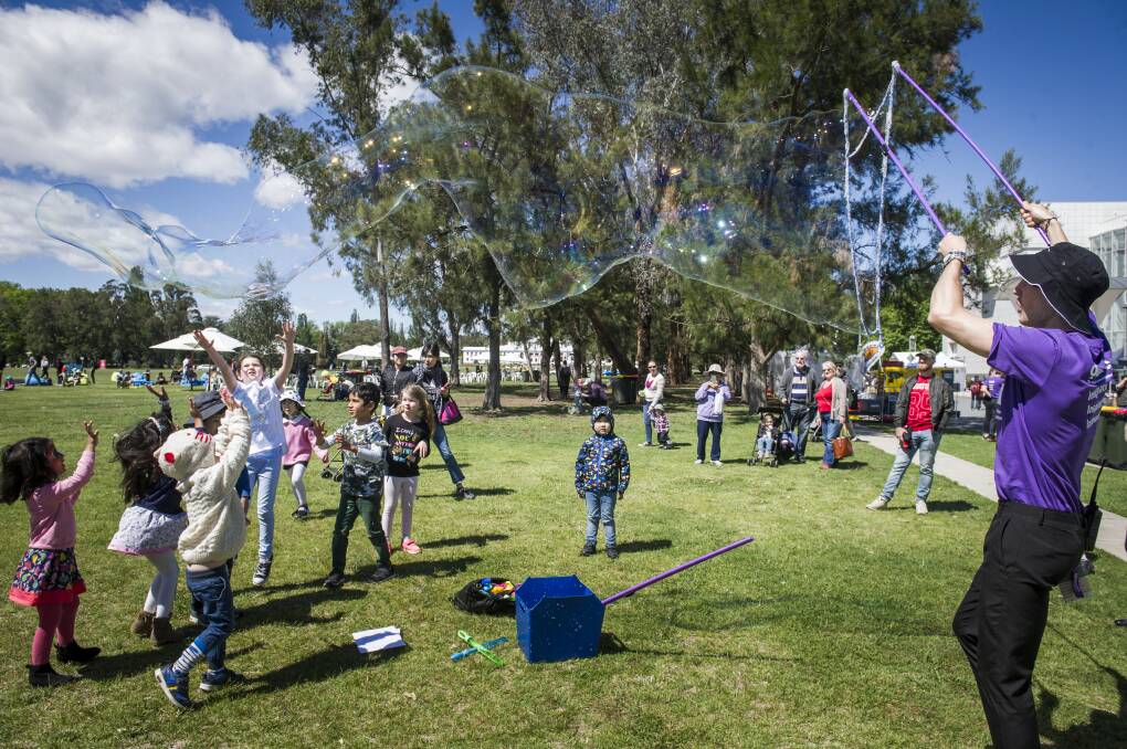 Bubble master Liam Johnson entertains kids at the Festival of Questacon in November 2018. The event, which attracted the National Science and Technology Centre's biggest visitor count in one day, was to mark its 30th birthday. Picture: Elesa Kurtz