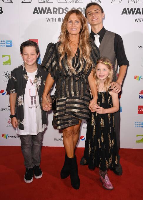 Kasey Chambers with her children Arlo (left), Poet (right), and Talon (second right) at the ARIA Awards last year. Picture: Dan Himbrechts
