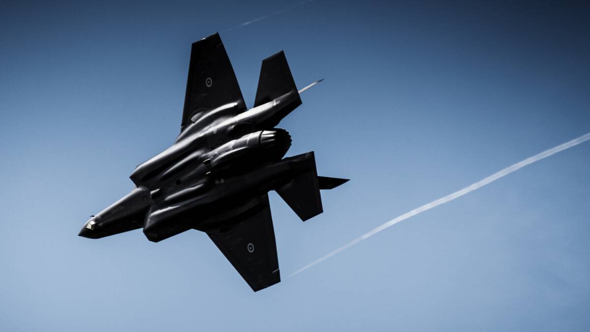 An F-35A Joint Strike Fighter flies over Williamtown RAAF base landing. Picture: Simon McCarthy