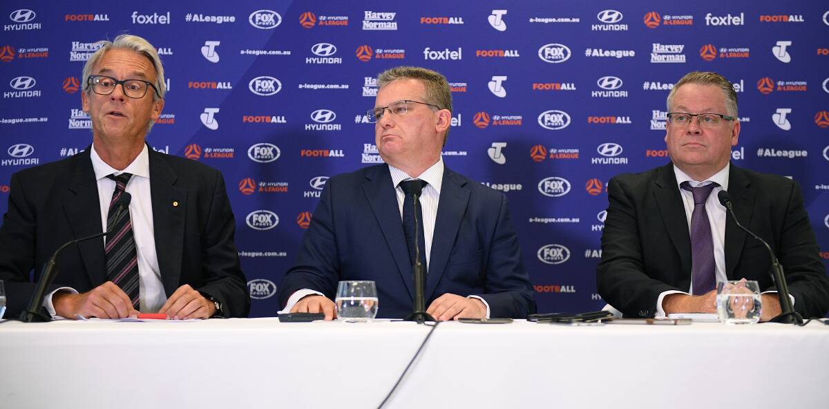 From left to right: FFA boss David Gallop, chairman Chris Nikou and head of leagues Greg O'Rourke at the expansion announcement in December. Picture: AAP