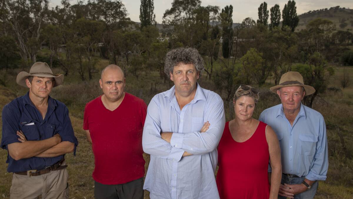 Tharwa residents Myles Gostelow, Karim Haddad, Kevin Jeffery, Janet Flint, and Michael Lonergan, who had called on the ACT government to change its plans for Tharwa's water prior to the inquiry. Photo: Sitthixay Ditthavong