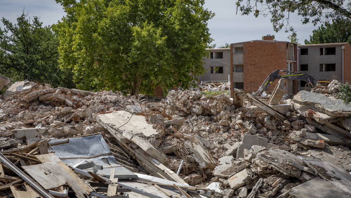 The demolition of public housing on Northbourne Avenue. The site has now been sold to a developer for a mixed-use precinct. Picture: Sitthixay Ditthavong