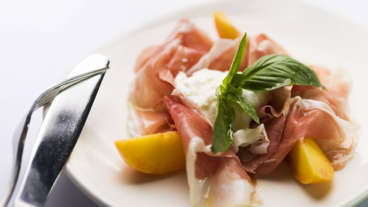 The prosciutto san daniele is perfectly matched with creamy stracciatella and peach. Picture: Dion Georgopoulos