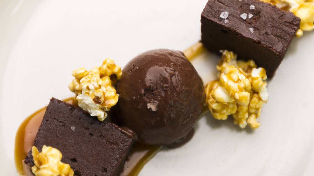 Flourless chocolate torte with salted caramel popcorn and chocolate sorbet. Picture: Dion Georgopoulos