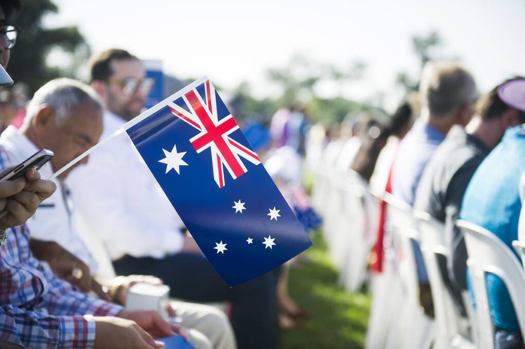 Last year's Australia Day flag raising and citizenship ceremony. Photo: Dion Georgopoulos