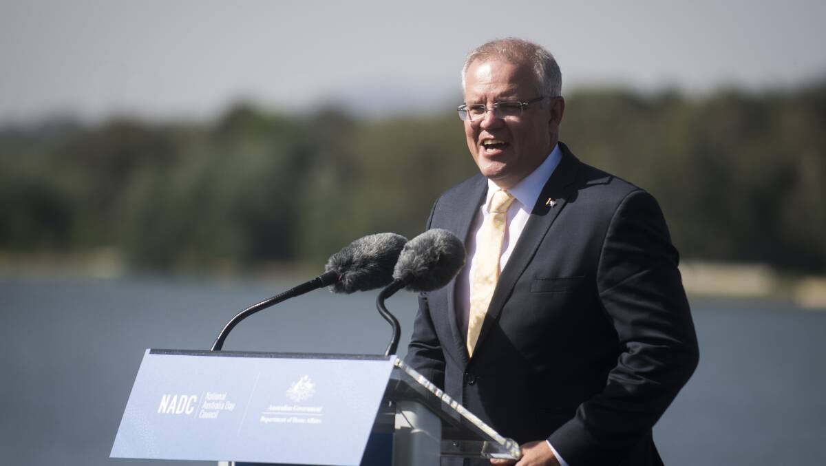 Prime Minister Scott Morrison during an Australia Day flag raising and citizenship ceremony in 2019. Picture: Dion Georgopoulos