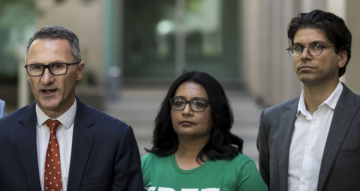 Greens senators Richard Di Natale and Mehreen Faruqi with the party's Canberra candidate, Tim Hollo. Picture: Dominic Lorrimer