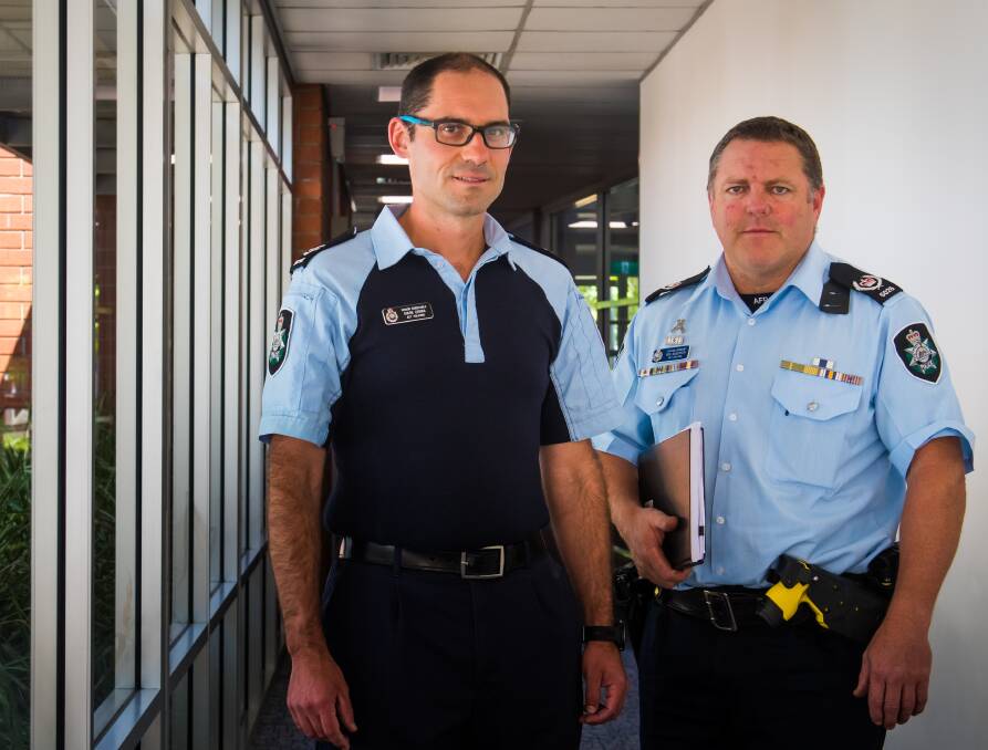 Two Canberra-based members of the disaster victim identification team are Senior Constable Mark Brima and Station Sergeant Rod Anderson. Picture: Elesa Kurtz