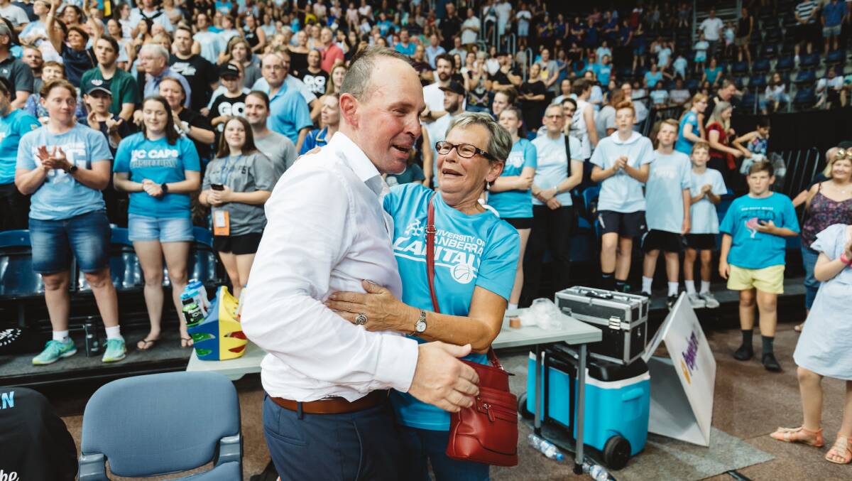 Canberra Capitals coach Paul Goriss celebrates a WNBL championship with his mother Lyn. Photo: 5 Foot Photography