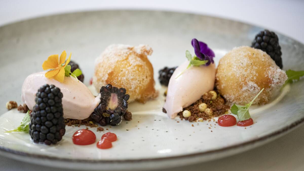 Lemon myrtle doughnuts, lemon and honey yoghurt, strawberry ice cream, blackberries, cookie nut crumble. Picture: Sitthixay Ditthavong