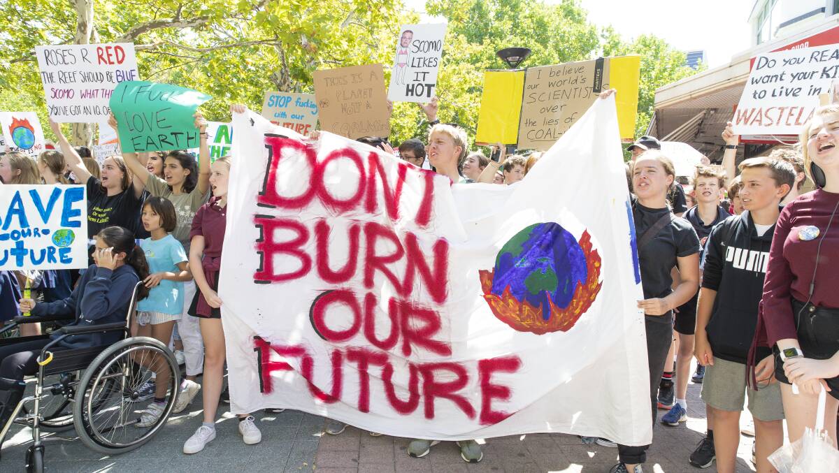 Canberra school students earlier this year striked from school against Adani's coal mine and climate change. Picture: Terry Cunningham