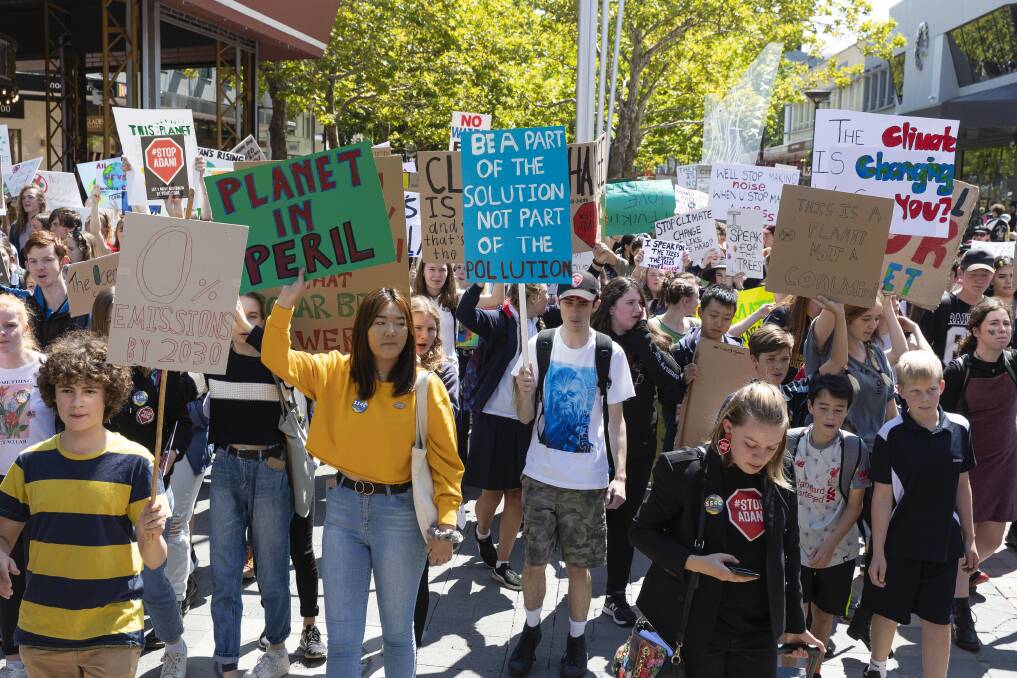 Canberra school students went on strike in March against Adani's coal mine and climate change. A global climate strike will be held on Friday. Picture: Terry Cunningham