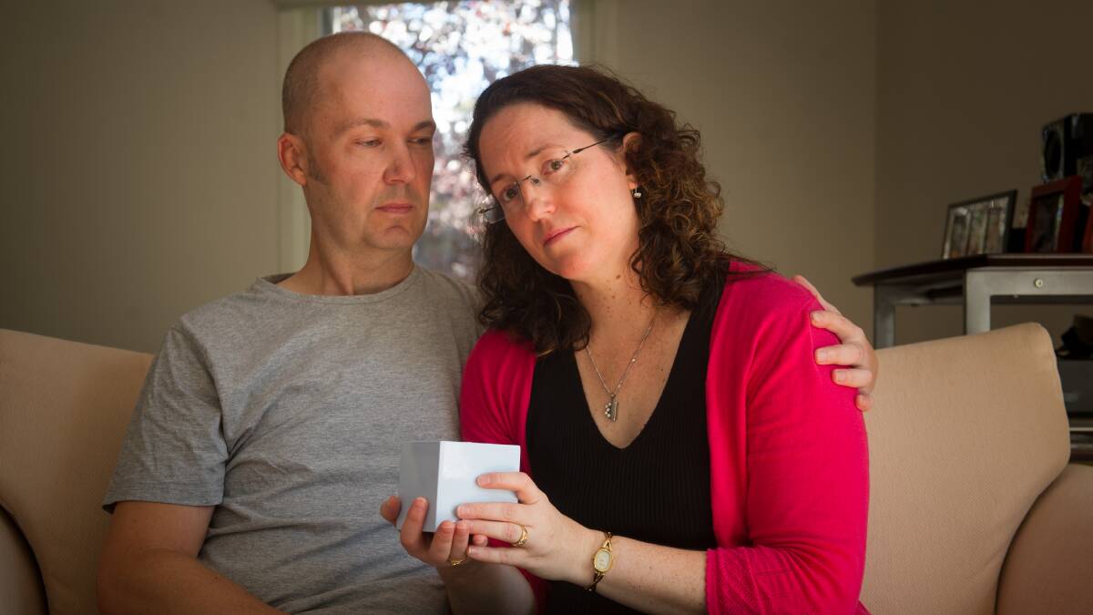 Daniel and Karen Schlage with the ashes of son Charlie. Picture: Elesa Kurtz