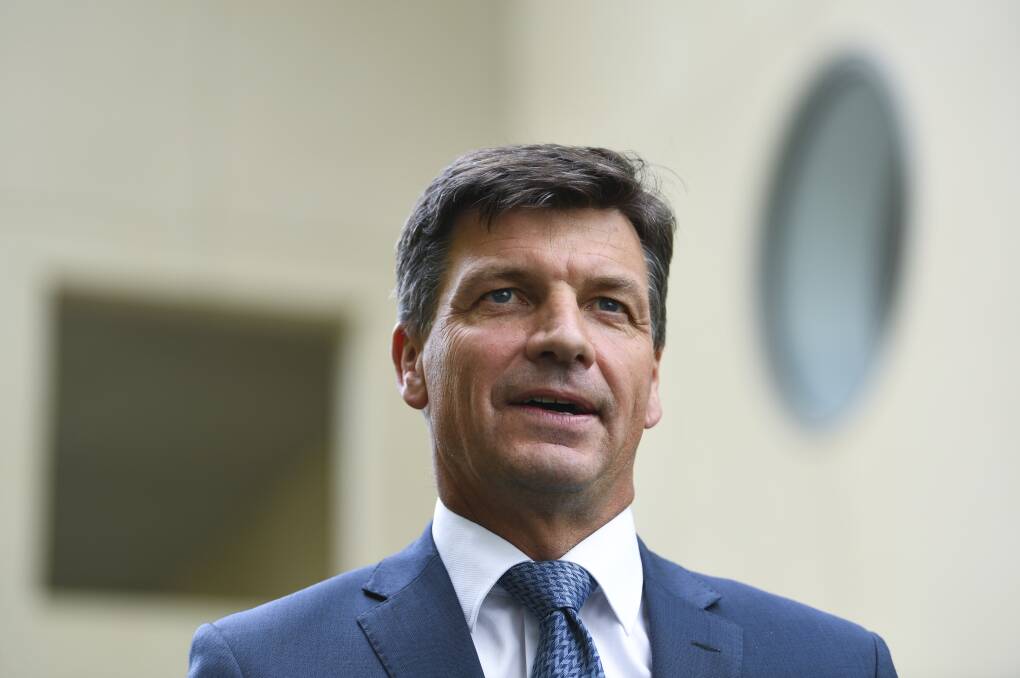 Energy Minister Angus Taylor says the government's electric vehicle strategy is not comparable to Labor's, despite both policies potentially leading to the same uptake of the technology. Photo: AAP. 