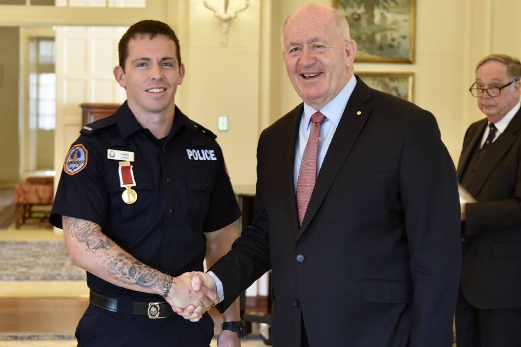Constable Zachary Rolfe, pictured with former Governor General Peter Cosgrove, received a bravery award this year. Picture: Supplied