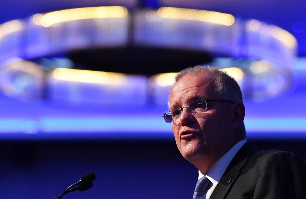 Prime Minister Scott Morrison delivers his federal budget lunch address at the Four Seasons hotel in Sydney on Friday. Photo: AAP Image/Dean Lewins