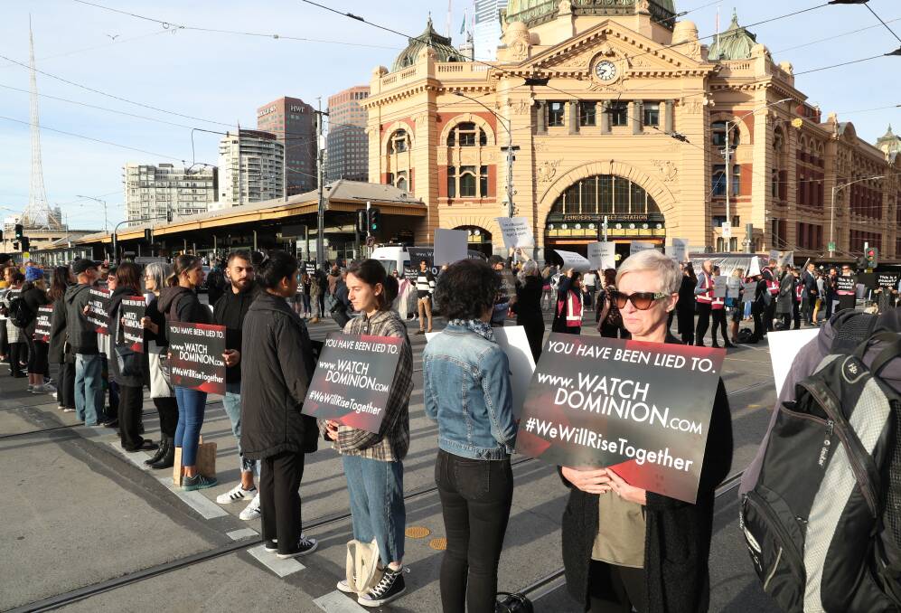 Animal rights protesters block intersections in Melbourne's CBD in April. Picture: AAP