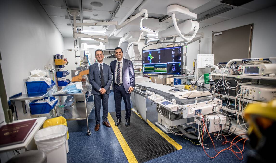 Staff specialist cardiologist Dr Muayad Alasady (left) and Dr Rajeev Pathak, director of cardiac electrophysiology, spearheaded the establishment of a comprehensive electrophysiology service at Canberra Hospital. Photo: Karleen Minney.