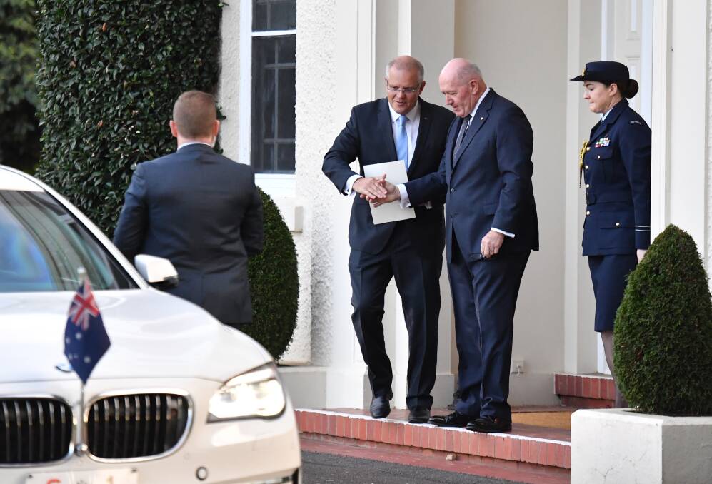 Prime Minister Scott Morrison leaves Government House after meeting with Governor General Peter Cosgrove on Thursday. Photo: AAP.  