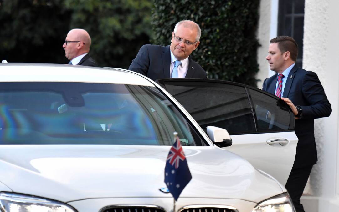 Prime Minister Scott Morrison leaves Government House after meeting with Governor General Peter Cosgrove on Thursday. Photo: AAP. 
