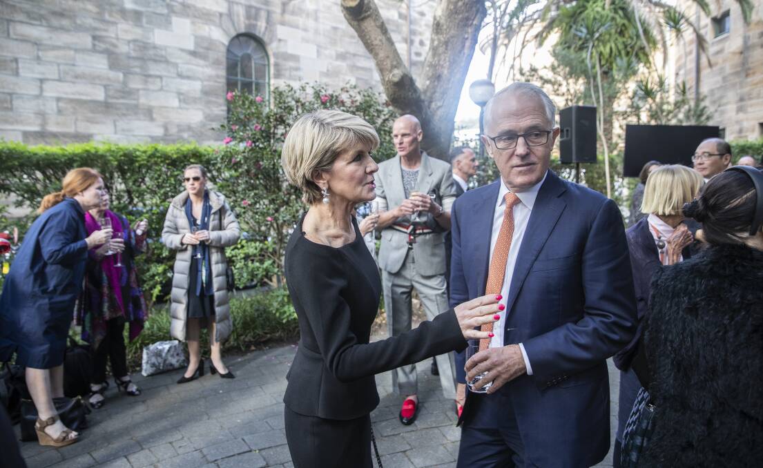 Former foreign minister Julie Bishop and former prime minister Malcolm Turnbull at Martyn Cook's memorial service on Thursday. Photo: Louie Douvis