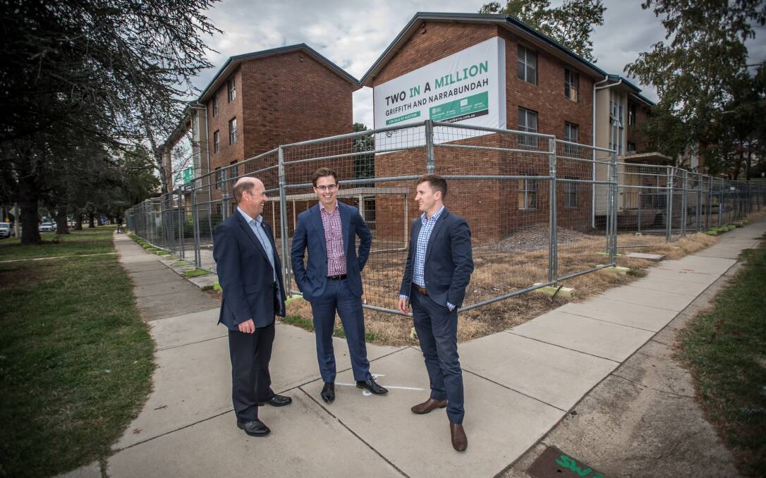 From left: Barry Morris, James Morris and Geordie Edwards at the site of the former Stuart Flats in Griffith. Photo: Karleen Minney.