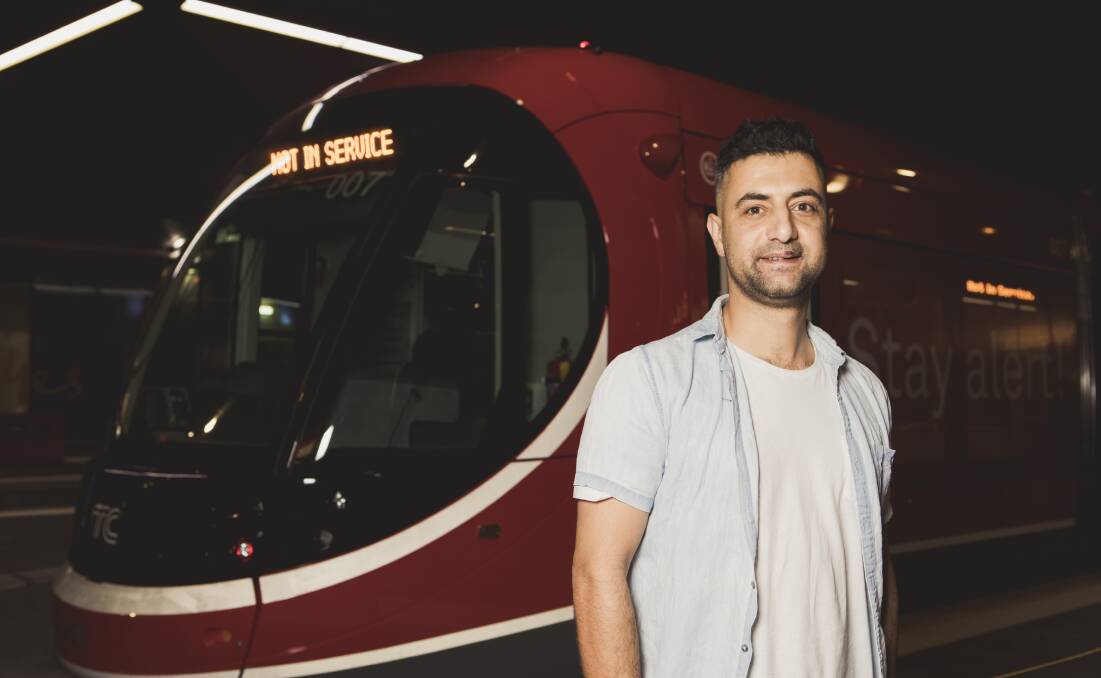Cool Barbers owner Hesam Najafian hopes the light-rail system will bring more business to his shop. Photo: Jamila Toderas
