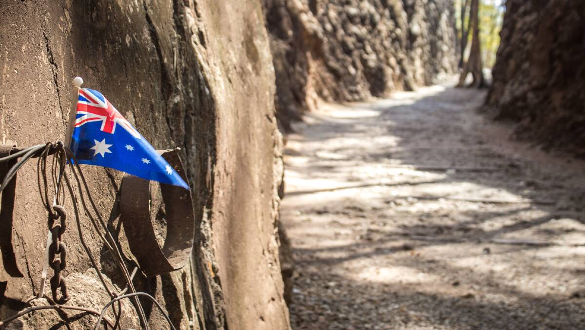 A small impromptu memorial for the Australian POWs at the start of the Hellfire Pass cutting. Photo: Michael Turtle
