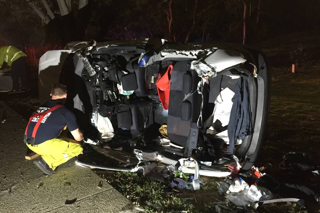 Emergency crews had to cut into the rood of the car to free the occupants. Photo: ACT ESA