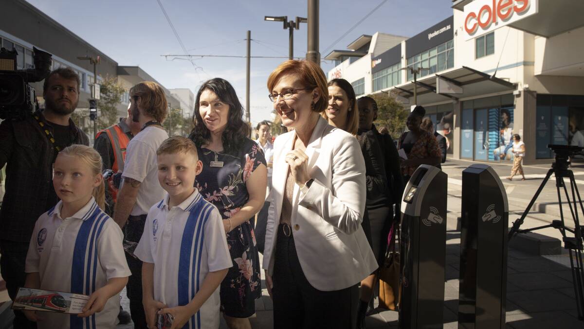 Transport minister Meegan Fitzharris boards the light rail on the community preview day. Photo: Sitthixay Ditthavong