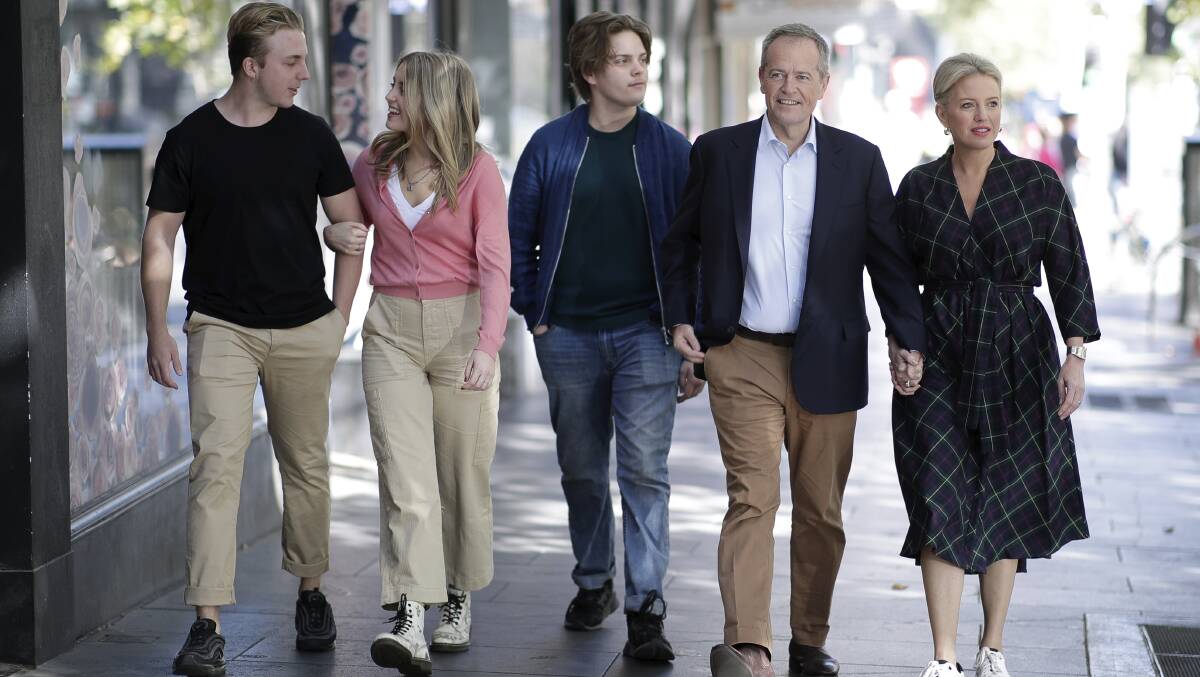 Opposition Leader Bill Shorten with wife Chloe, son Rupert (centre) and daughter Georgette with her boyfriend Pat (left) arrive during a visit to the Salvation Army's Lighthouse Cafe in Melbourne on Good Friday. Photo: Alex Ellinghausen