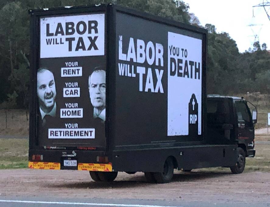 A truck displaying political advertising referring to Labor taxes - clearly authorised by the Liberal Party. Picture: Supplied
