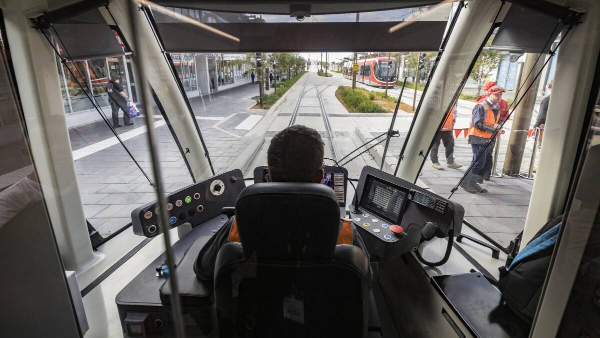 A Canberra light rail driver prepares to depart Gungahlin on the first day of operations. Picture: Sitthixay Ditthavong