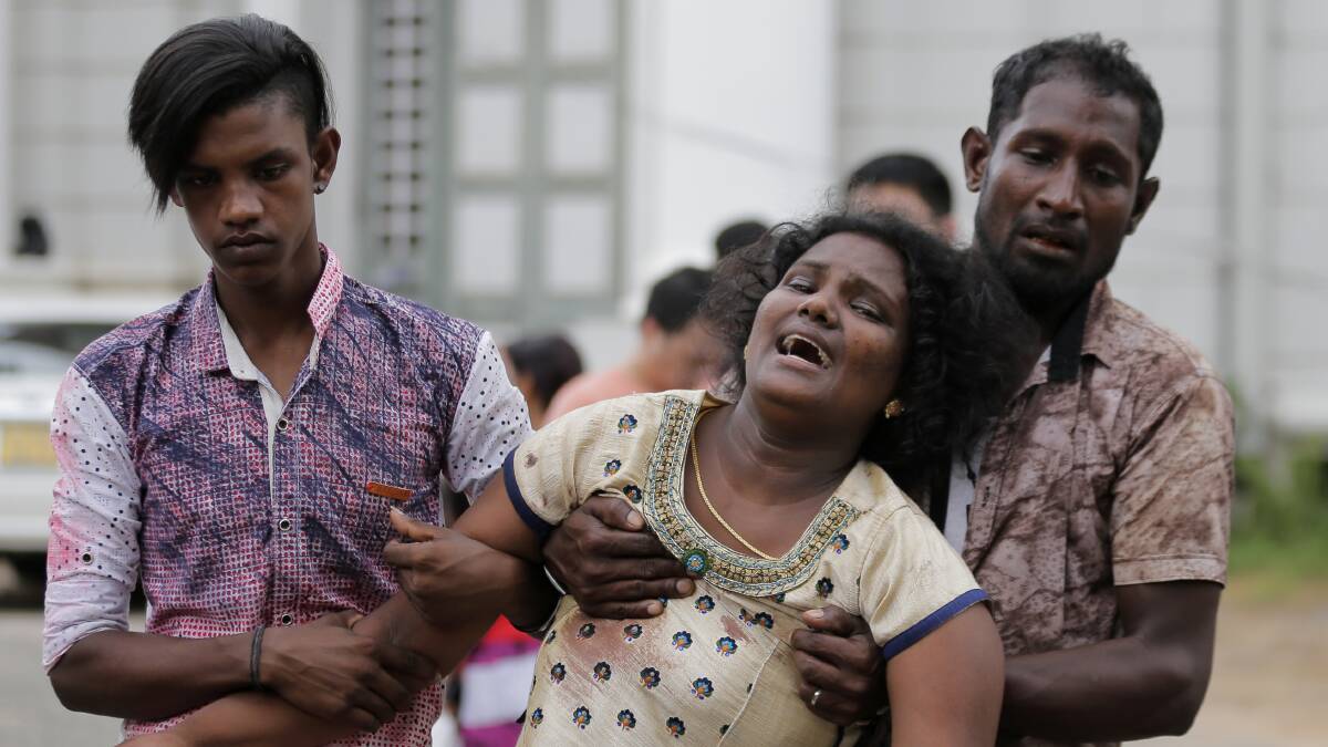 Relatives of a blast victim grieve outside a morgue in Colombo, Sri Lanka. Photo: AP Photo/Eranga Jayawardena