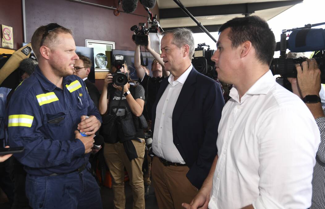 Labor leader Bill Shorten speaks to workers during a visit to Gladstone Ports on Tuesday. Photo: AAP