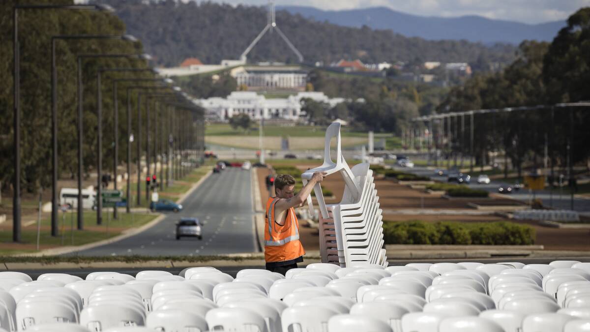 Workers prepare the Australian War Memorial on Tuesday for Anzac Day. Photo: Sitthixay Ditthavong