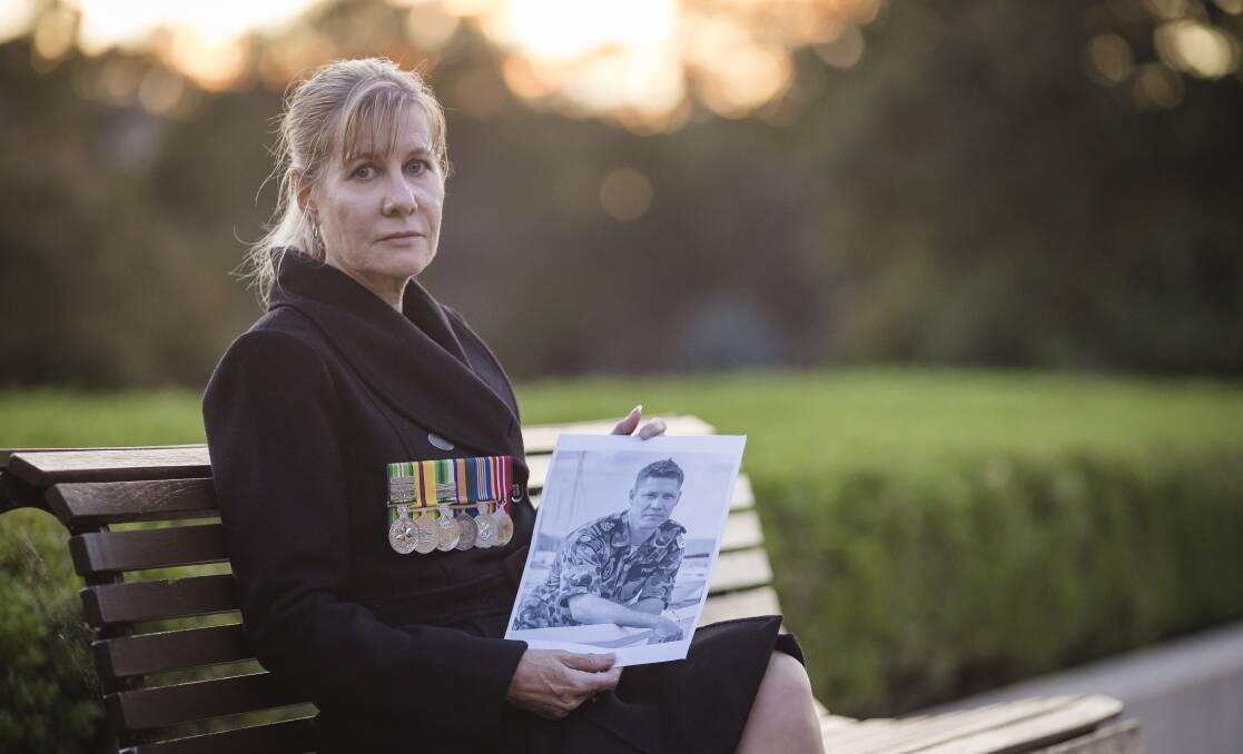 Julie-Ann Finney with a picture of her son, David, who took his own life this year after suffering post-traumatic stress. Photo: Sitthixay Ditthavong
