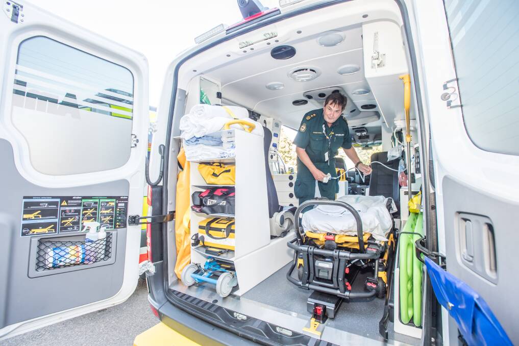ACT chief ambulance officer Howard Wren showing off the new ambulances. Photo: Karleen Minney